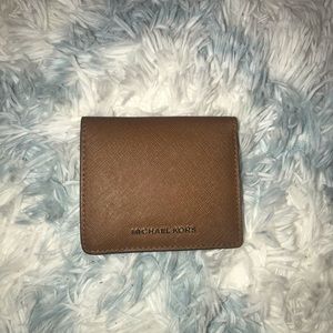 Brown Michael Kors trifold wallet